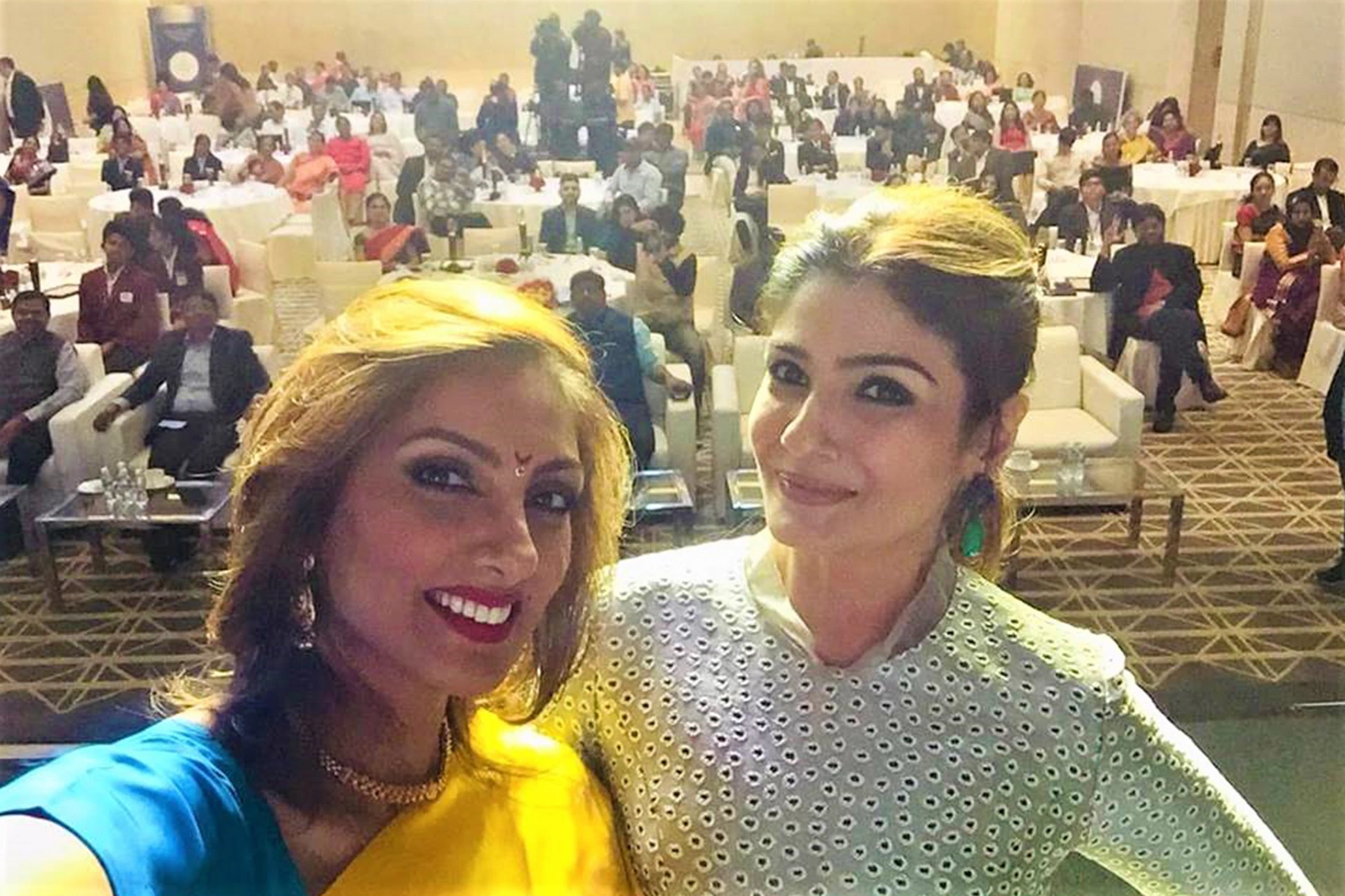 Pallavii Waalia Raaj on stage with Raveena Tandon